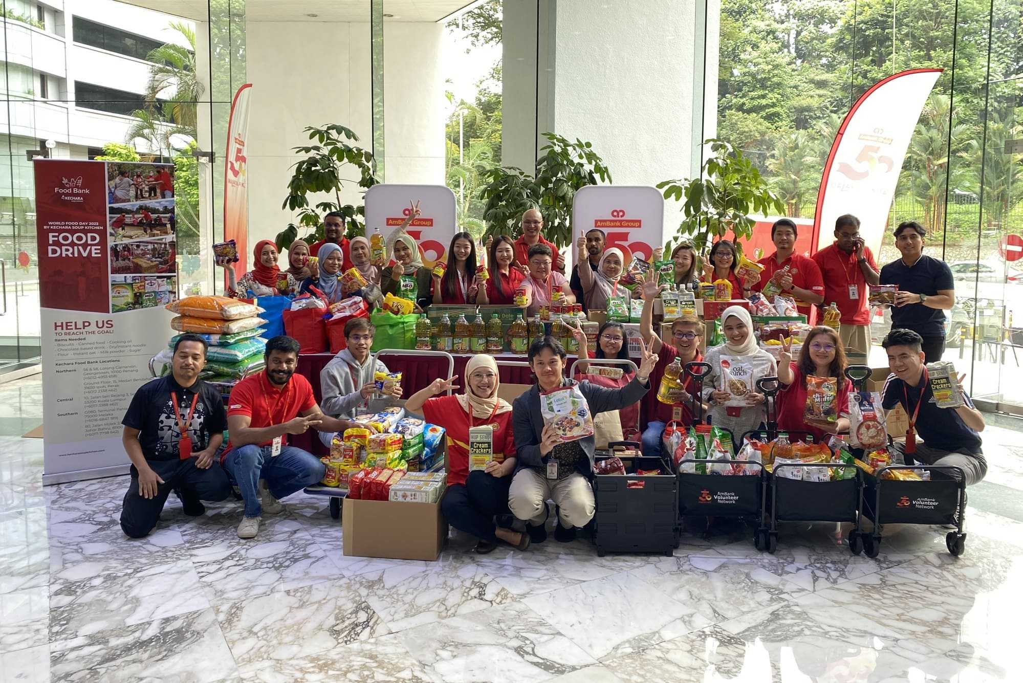Children receiving school supplies from a KSK School Mission programme event